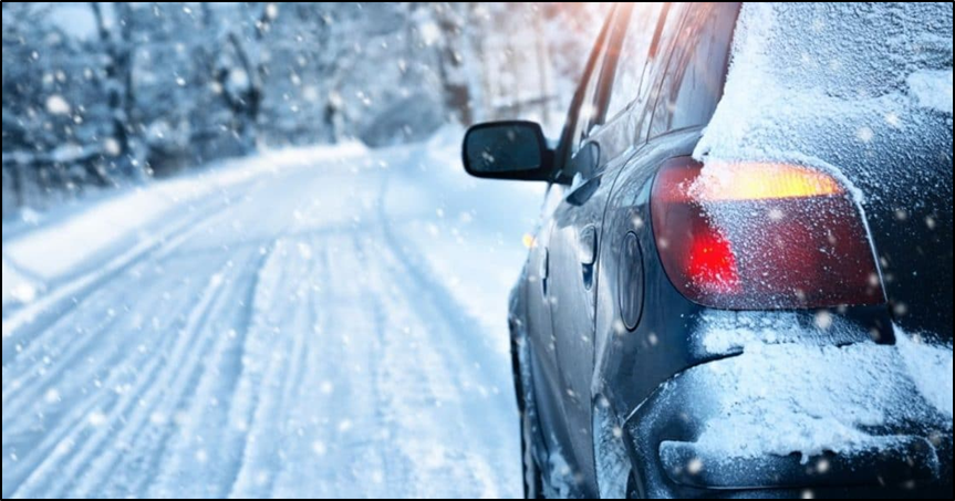 Car on snow road