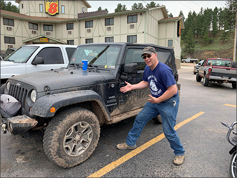 Black Jeep parked with our staff - Sanderson Auto Repair